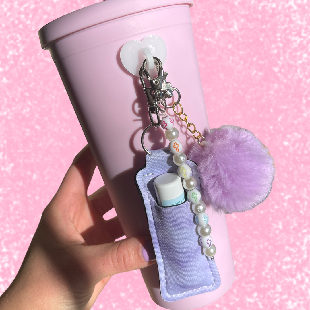 https://charcharms.com/cdn/shop/products/CharCharmsWaterBottleAccessories_WaterBottleStickers_ChapstickHolder_CuteWaterBottle1.png?v=1680818695&width=1080